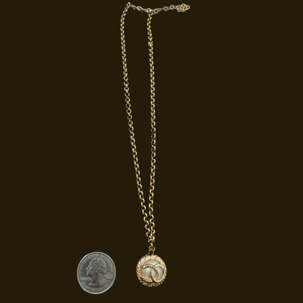 Authentic Channel button transformed into a super nice necklace.
